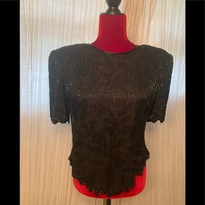 Vintage sequenced top.